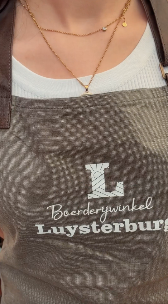 Schort met logo Luysterburg